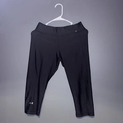 Capri Under Armour HeatGear Armour para mujer; negro/plateado metálico; grande Foto 1 de 4