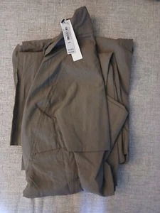 NEU MIT ETIKETT VICTORIA'S SECRET VSX POWER FALLSCHIRM JUMPSUIT TERRA OLIV GRÖSSE MEDIUM - Bild 1 von 3