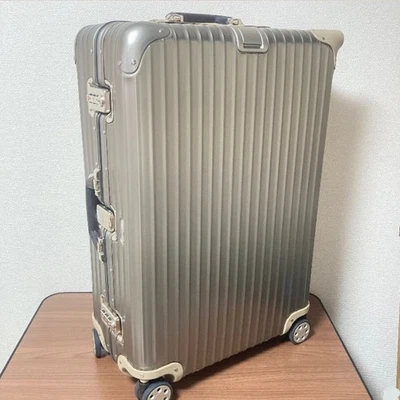 Mala de transporte Rimowa Topas Premium 82L ouro champanhe 4 rodas - Imagem 1 de 4