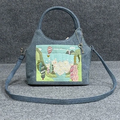 Bolso de mano Fossil Forever Blu Rosalita de mezclilla bordado con dije de llave Foto 1 de 4