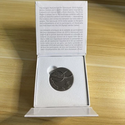 Medalla de participación en los Juegos Olímpicos de Vancouver 2010 nueva en caja orca de bronce plateado Foto 1 de 4
