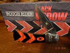 ROUGH RIDER 3.63" CLOSED POCKET KNIFE RED & BLACK TURQUOISE HANDLE 440 S.MUST C - Picture 1 of 12