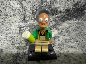 Minifiguras LEGO CMF Los Simpson Serie 1 - Apu con Squishee - Completas - Imagen 1 de 12