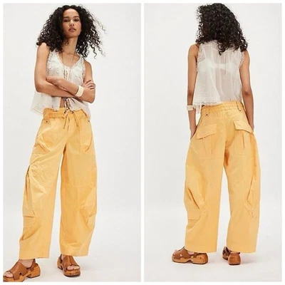 Pantalones de inicio Free People naranja holgados barril holgados medianos DEFECTUOSOS Foto 1 de 4
