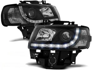 Scheinwerfer Set mit Tagfahrlichtoptik für VW T4 Bus BJ 08/96-03/03 Klar Schwarz - Bild 1 von 2