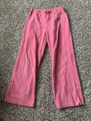 Pantalones deportivos de lana North Face rosa talla M (10-12) para niñas Foto 1 de 2