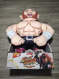 Peluche parlante Jazwares Wrestling Buddies Street Fighter Kenny Omega (Akuma) 17" - Imagen 1 de 3