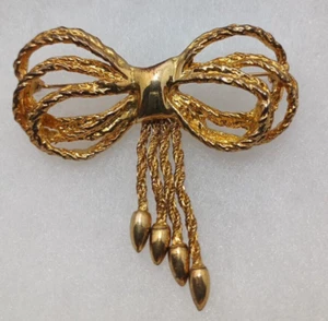 Spilla vintage con fiocco in corda nastro tono oro spilla da bavero con pendenti - Foto 1 di 3