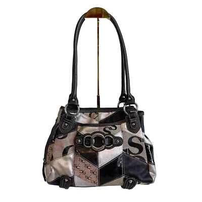 Bolso de hombro Sophia Caperelli negro neutro retazos magnético de mano Foto 1 de 4