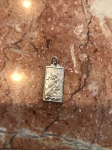 Sterling silver charm of Mary and prayers on back .5 Grams - Picture 1 of 5
