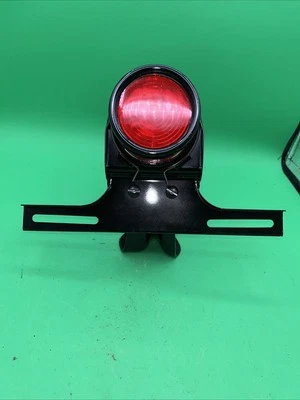 Lámpara de luz trasera eléctrica modelo T Ford vintage con soporte de matrícula 1926 27 Foto 1 de 4