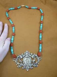 (v499-1) gerollter Cherub Messing roter Zinnober + türkisfarbene Perlen 28" lange Halskette - Bild 1 von 3
