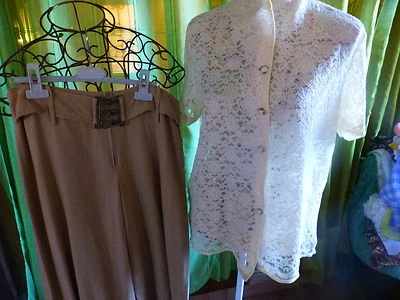 bel ensemble ,pantalon -jupe et corsage couleur ivoire dentelle  - Photo 1/4