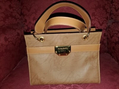 NINA RICCI - De colección - Bolsa en polvo en piel de becerro con herrajes dorados Foto 1 de 4