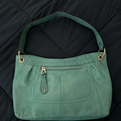 Bolso de Hombro B Makowsky Cuero Verde Azulado Tono Plateado Logo Ojales Foto 1 de 4