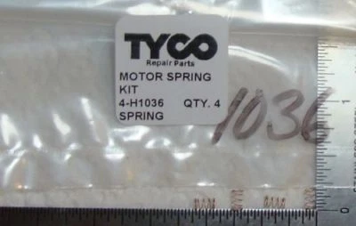 4 NEW MOTOR SPRINGS, TYCO PART # H1036 KIT FOR TYCO TRAINS MADE IN HONG KONG - Image 1 of 2