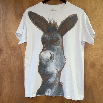 Camiseta De Colección Universal Studios Shrek 4D Burro Unisex Talla Mediana Tostada/Arena Foto 1 de 4