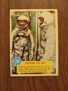 1963 Topps NASA Astronaut card #39 - Checking His Suit