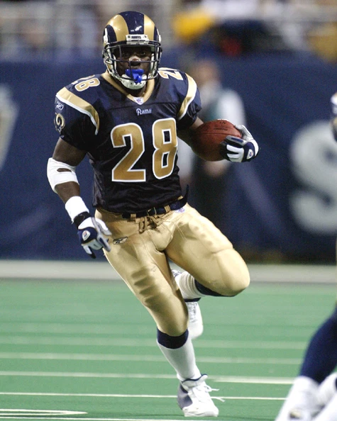 Póster brillante impresión foto fútbol americano 8x10 de los St Louis Rams Marshall Faulk patio 2011 Foto 1 de 1