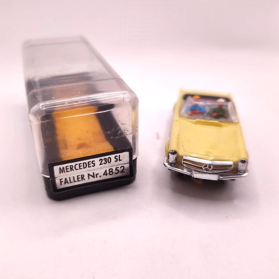 Трассовая автомодель Faller AMS 4852 Mercedes 230 SL HO бледно-желтая с чехлом винтажная Tjet - Изображение 1 из 4