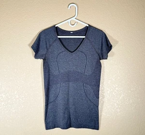 Top donna Lululemon Run Swiftly Tech scollo a V taglia 8 grigio - Foto 1 di 6