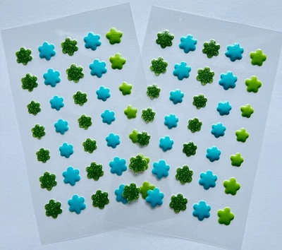 💚PEGATINAS BURBUJA FLOR MARGARITA 2 hojas verde epoxi brillo y azul turquesa 70 piezas Foto 1 de 4