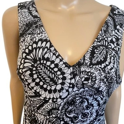 Vestido midi floral negro blanco sin mangas cuello en V verano informal elegante Foto 1 de 4