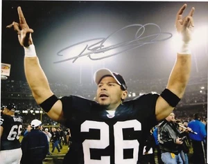 ROD WOODSON OAKLAND RAIDERS ACTION SIGNED 8x10 - Picture 1 of 1