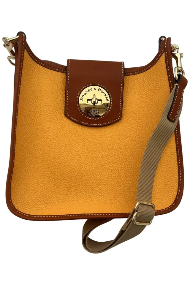 Mensajero de león de cuero Dooney & Bourke Turnlock Foto 1 de 1