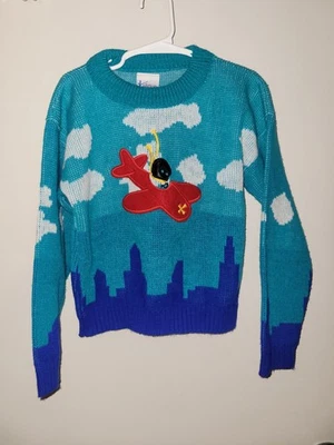 Cardigã infantil de malha vintage suéter azul avião piloto nuvens feito nos EUA - Imagem 1 de 4