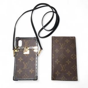 Coque téléphone LOUIS VUITTON monogramme avec sangle, housse ordinateur portable cuir lot de 2 occasion - Photo 1 sur 18