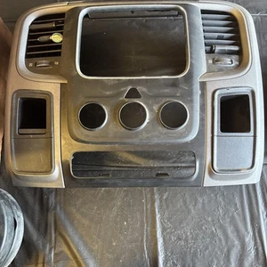 2013-2018 DODGE RAM 1500 DASHBOARD RADIO CLIMATE CONTROL AIR VENT BEZEL OEM - Picture 1 of 7