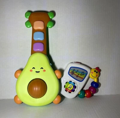Guitarra de aguacate Rock-A-Mole Skip Hop Farmstand y reproductor de música Baby Einstein raro Foto 1 de 4