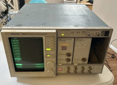 Osciloscopio de panel táctil digitalizador TEKTRONIX 11402 con amplificador 11A32 y 11A71 Foto 1 de 4