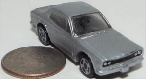 Small Tomy Yujin Plastic Mercedes-Benz Coupe in Red with a Black Roof - Picture 1 of 3