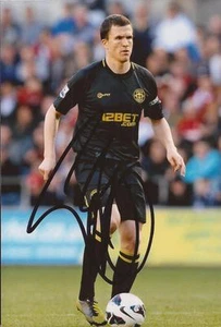 WIGAN: GARY CALDWELL SIGNED 6x4 ACTION PHOTO+COA - Imagen 1 de 1