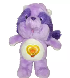 Peluche Kenner 1984 vintage brillante corazón mapache cuidado oso primos púrpura - Imagen 1 de 6