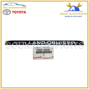 75435-60040 Genuine Toyota ORNAMENT, BACK DOOR 7543560040 OEM FJ80 1991-97 - Picture 1 of 3