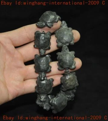 China Hongshan Cultura meteorito hierro tallado tortuga amuleto pulsera anillo de mano Foto 1 de 4