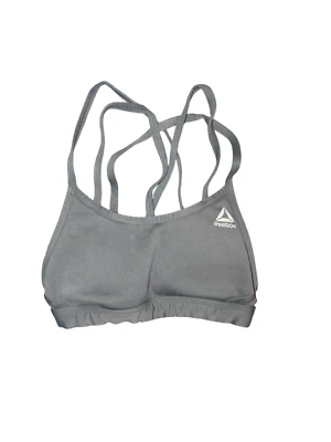 Sujetador deportivo con tiras Reebok Hero para mujer acolchado inalámbrico M gris soporte ropa deportiva Foto 1 de 4