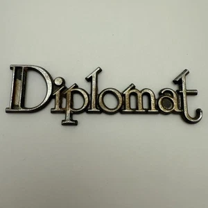 Vtg 1977 - 1980 Dodge Diplomat Plymouth Emblem Badge Nameplate OEM 4 3/8" - Picture 1 of 12