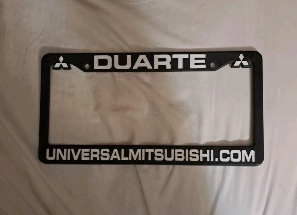 Marco de matrícula Mitsubishi Duarte universal raro único auténtico Foto 1 de 4