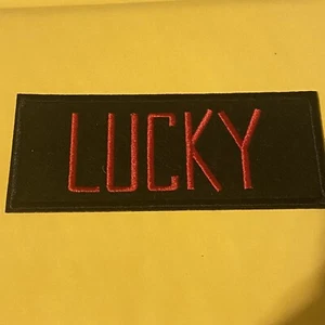 Ghostbusters: Disfraz/Uniforme Parche Planchado: LUCKY (4 1/2" x 1-7/8") NUEVO - Imagen 1 de 1