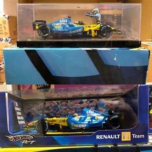 SET OF 2 RENAULT F1 MODELS 2005 & 2006 CONSTRUCTOR CHAMPIONS 1:18 by HOT WHEELS  - Picture 1 of 3
