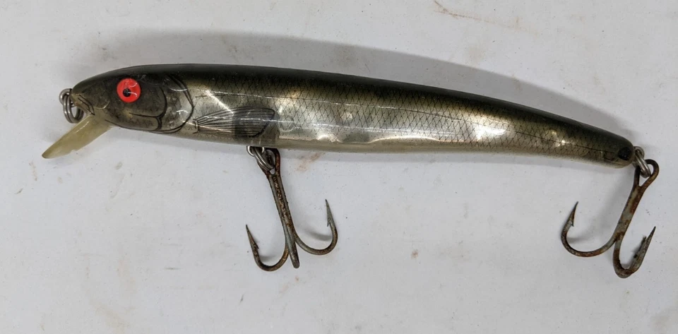 BOMBARDERO GRADO AGUA SALADA LARGO A 6" 7/8 OZ PLATA Negro Humo De colección  Foto 1 de 4