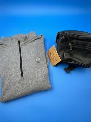 Pullover de golf con cremallera 1/4 recto y riñonera negra Highland II Travelware Foto 1 de 4