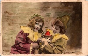 The New Clown Children Holding a Cat Hand-Tinted Postcard - Picture 1 of 2