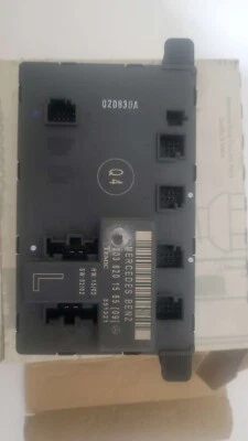 NEW MERCEDES BENZ C320  FRONT LEFT DOOR CONTROL MODULE Part # 203 820 15 85 - Image 1 of 3