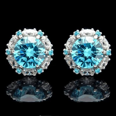 Pendientes de oro blanco de 14 k con halo de topacio azul marquesa con diamantes simulados atornillados de 2 quilates Foto 1 de 4