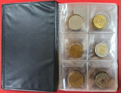 A collection of different types of coins in a folder  60 pieces - Image 1 of 4